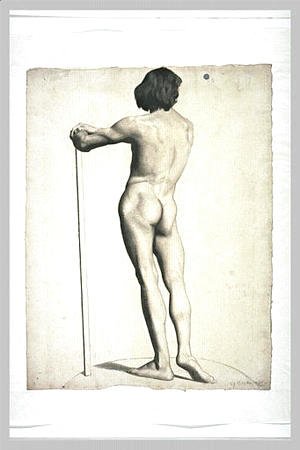 Man standing, leaning on a stick